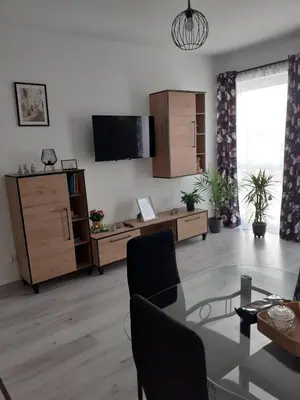 Telewizja i/lub zestaw kina domowego w obiekcie Apartament w Starym Młynie