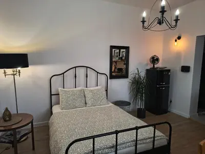 Łóżko lub łóżka w pokoju w obiekcie Apartament Wieżyczka