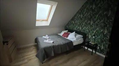 Łóżko lub łóżka w pokoju w obiekcie All Season Klimat - Dom przy szlaku z prywatnym tarasem i widokiem na Góry Orlickie - Sudety Sauna&Jacuzzi, Skalne Miasto, 4km do Zieleniec SKI Arena