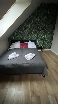 Łóżko lub łóżka w pokoju w obiekcie All Season Klimat - Dom przy szlaku z prywatnym tarasem i widokiem na Góry Orlickie - Sudety Sauna&Jacuzzi, Skalne Miasto, 4km do Zieleniec SKI Arena