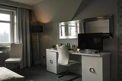 Telewizja i/lub zestaw kina domowego w obiekcie Pałac Brzeźno Spa & Golf