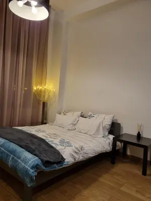 Łóżko lub łóżka w pokoju w obiekcie Rukadel - Tadeusza Kościuszki