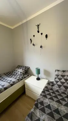 Łóżko lub łóżka w pokoju w obiekcie Sasanka LZ
