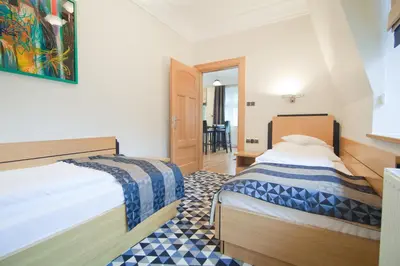 Łóżko lub łóżka w pokoju w obiekcie Villa Alina Medical SPA