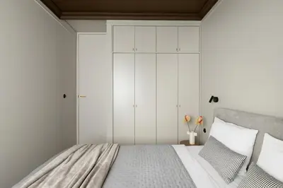Łóżko lub łóżka w pokoju w obiekcie Entu Apartamenty Odrzanska