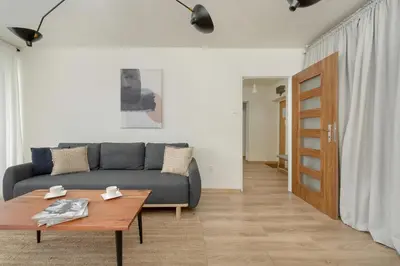 Część wypoczynkowa w obiekcie Charming Apartment Trzebnicka by Noclegi Renters