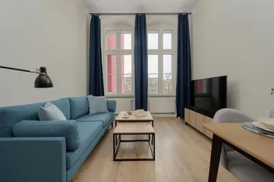 Telewizja i/lub zestaw kina domowego w obiekcie Piłsudskiego Stylish Apartment by Noclegi Renters