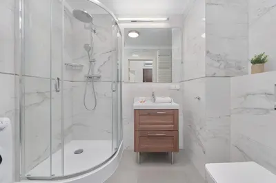 Łazienka w obiekcie Piłsudskiego Stylish Apartment by Noclegi Renters