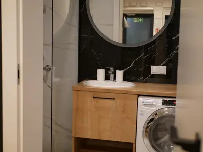 Łazienka w obiekcie Przytulna kawalerka 77