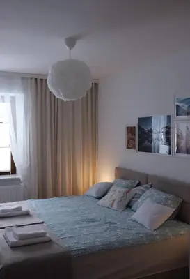 Łóżko lub łóżka w pokoju w obiekcie APARTAMENT Pod Lasem Jedlina Zdrój