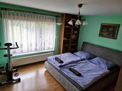 Łóżko lub łóżka w pokoju w obiekcie Dom Wakacyjny JM