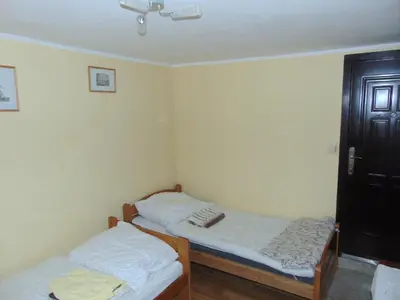 Łóżko lub łóżka w pokoju w obiekcie Apartament - Stronie Śląskie