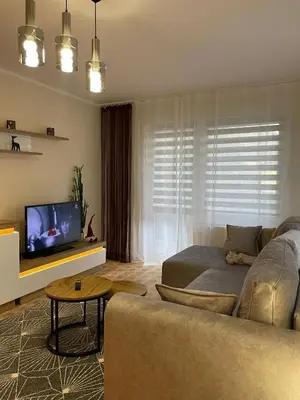 Telewizja i/lub zestaw kina domowego w obiekcie Apartament Pogodna