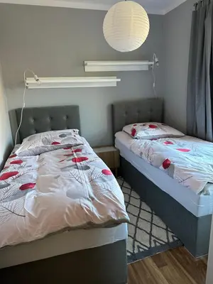 Łóżko lub łóżka w pokoju w obiekcie Apartament Wałbrzych