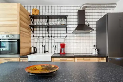 Kuchnia lub aneks kuchenny w obiekcie Elegant Apartment Tumskie Ogrody with FREE GARAGE Wrocław by Noclegi Renters