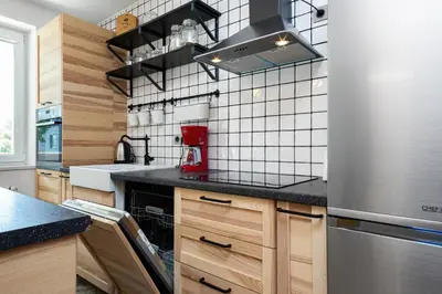 Kuchnia lub aneks kuchenny w obiekcie Elegant Apartment Tumskie Ogrody with FREE GARAGE Wrocław by Noclegi Renters