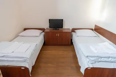 Łóżko lub łóżka w pokoju w obiekcie Centrum Edukacyjno-Rozwojowe Wrocław Pawłowice - bezpłatny parking