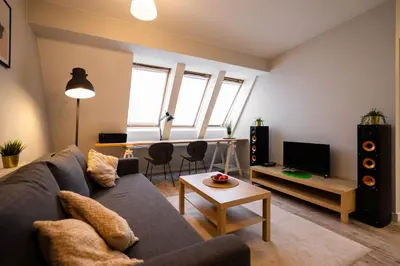 Telewizja i/lub zestaw kina domowego w obiekcie Wąska 5 Apartamenty
