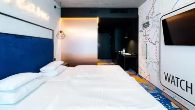 Łóżko lub łóżka w pokoju w obiekcie Aparthotel Biała Perła - Czarna Góra Resort, Sun & Snow