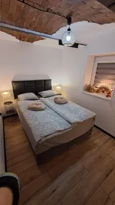 Łóżko lub łóżka w pokoju w obiekcie Wiejsko-Sielsko