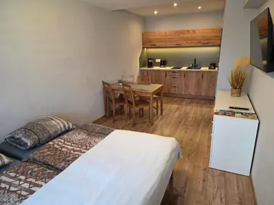 Telewizja i/lub zestaw kina domowego w obiekcie ApartHotel9
