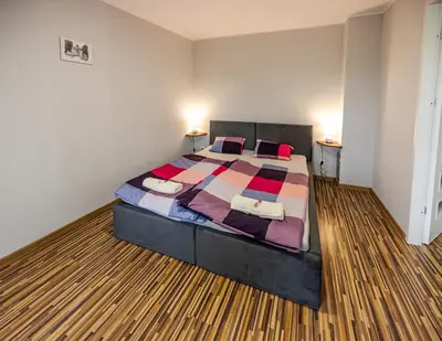 Łóżko lub łóżka w pokoju w obiekcie Domek przy Rynku