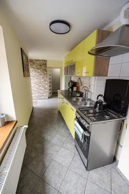 Kuchnia lub aneks kuchenny w obiekcie Domek przy Rynku