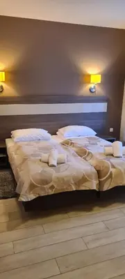 Łóżko lub łóżka w pokoju w obiekcie Apartamenty Czarna Góra T17