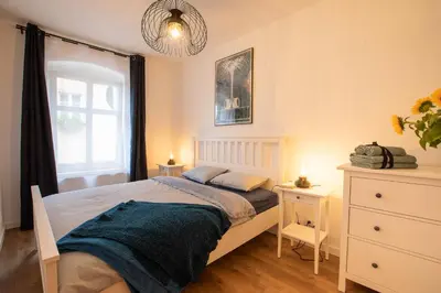 Łóżko lub łóżka w pokoju w obiekcie Apartament Radków/Góry Stołowe/Kotlina Kłodzka