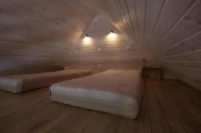 Łóżko lub łóżka w pokoju w obiekcie Apartament Agroturystyka Koniec Świata