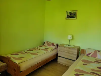 Łóżko lub łóżka w pokoju w obiekcie Hubiza