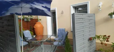 Patio lub wspólna przestrzeń na świeżym powietrzu w obiekcie Apartament Greta