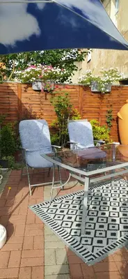 Patio lub wspólna przestrzeń na świeżym powietrzu w obiekcie Apartament Greta