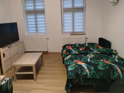 Łóżko lub łóżka w pokoju w obiekcie Apartament Tereska