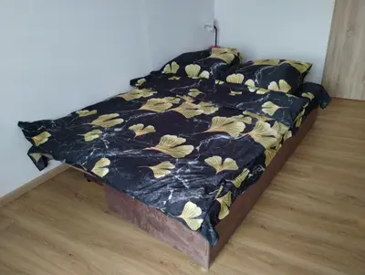 Łóżko lub łóżka w pokoju w obiekcie Apartament Tereska