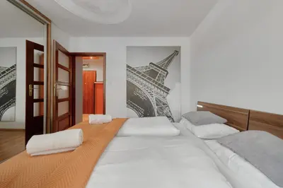 Łóżko lub łóżka w pokoju w obiekcie Tęczowa Apartment in Wrocław by Rent like home