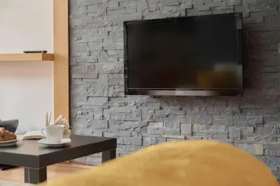 Telewizja i/lub zestaw kina domowego w obiekcie Tęczowa Apartment in Wrocław by Rent like home