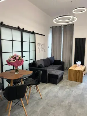 Część wypoczynkowa w obiekcie LOFT w centrum z jacuzzi