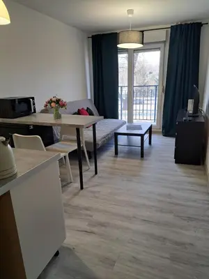 Łóżko lub łóżka w pokoju w obiekcie Apartament AQUA Centrum Borowska