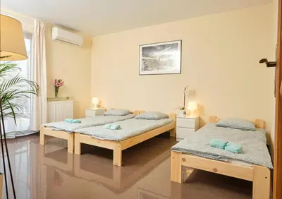 Łóżko lub łóżka w pokoju w obiekcie Apartament Słoneczny 8