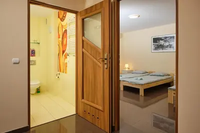 Łóżko lub łóżka w pokoju w obiekcie Apartament Słoneczny 8
