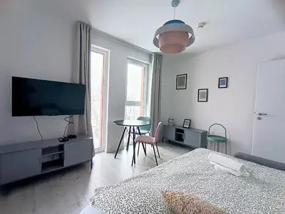 Telewizja i/lub zestaw kina domowego w obiekcie AmaMolto Apartamenty - Włoskie Inspiracje