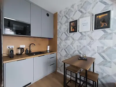 Kuchnia lub aneks kuchenny w obiekcie AmaMolto Apartamenty - Włoskie Inspiracje