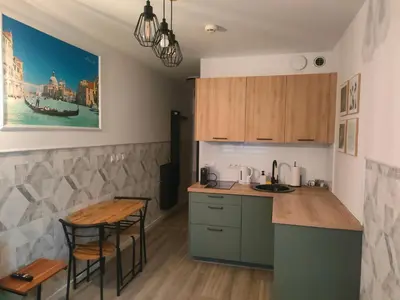Kuchnia lub aneks kuchenny w obiekcie AmaMolto Apartamenty - Włoskie Inspiracje