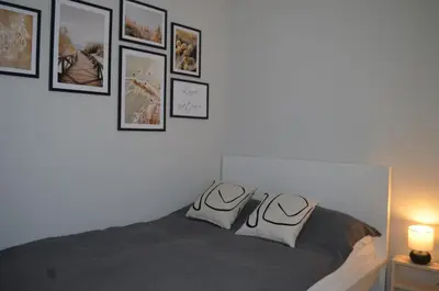 Łóżko lub łóżka w pokoju w obiekcie Apart city break apartament