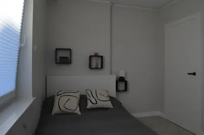 Łóżko lub łóżka w pokoju w obiekcie Apart city break apartament