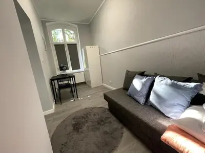 Część wypoczynkowa w obiekcie Duży Apartament - Stare Miasto - 12 osób - 6 łóżek