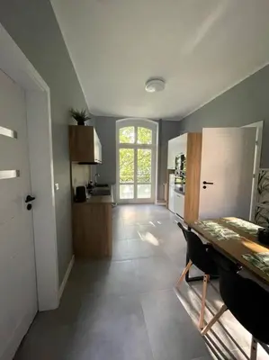 Kuchnia lub aneks kuchenny w obiekcie Duży Apartament - Stare Miasto - 12 osób - 6 łóżek