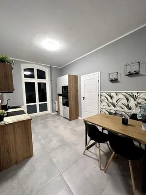 Kuchnia lub aneks kuchenny w obiekcie Duży Apartament - Stare Miasto - 12 osób - 6 łóżek