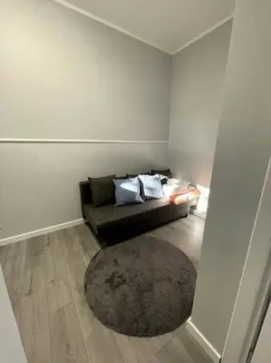 Część wypoczynkowa w obiekcie Duży Apartament - Stare Miasto - 12 osób - 6 łóżek